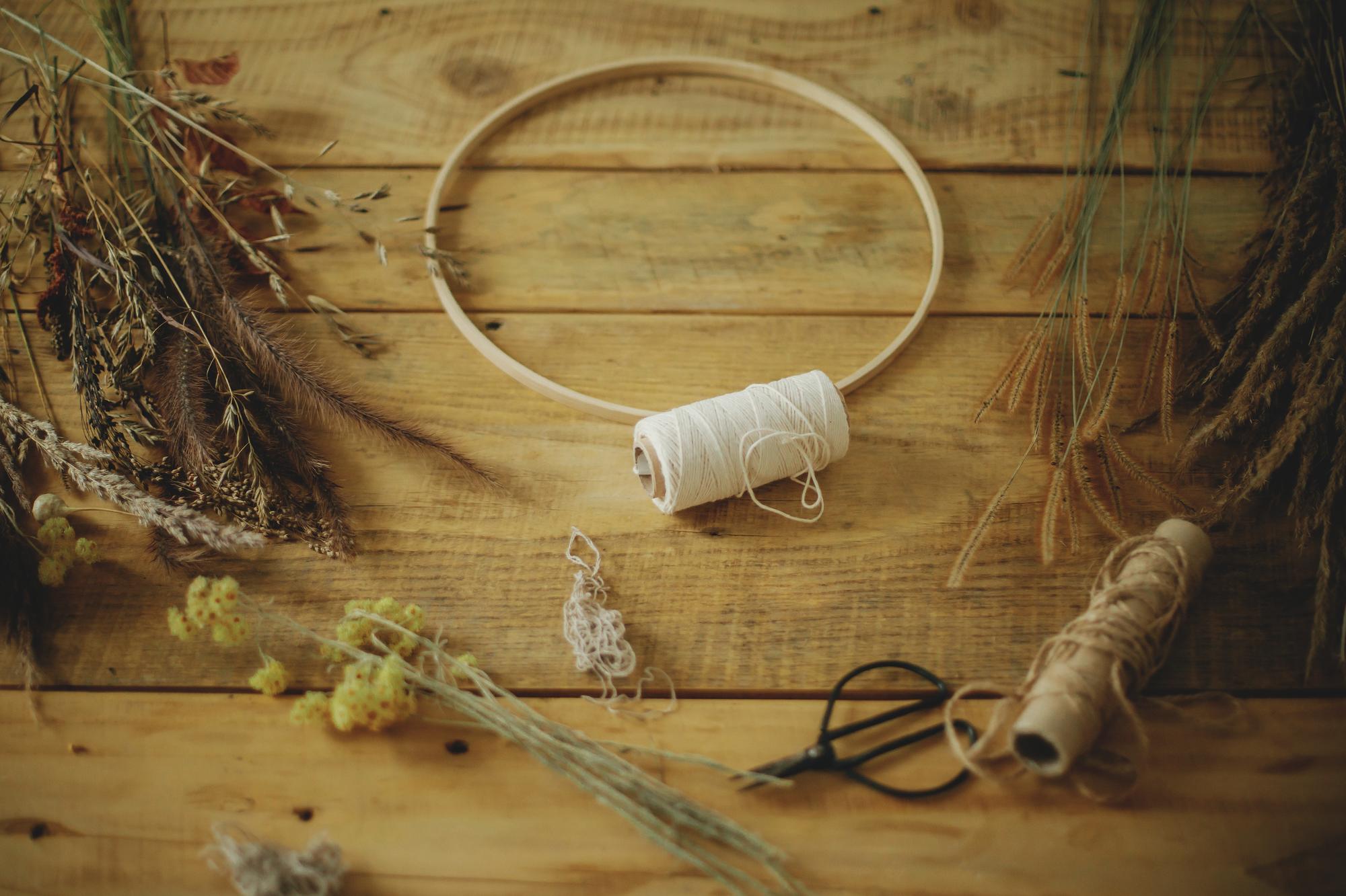 Studio workspace with threads and hoops