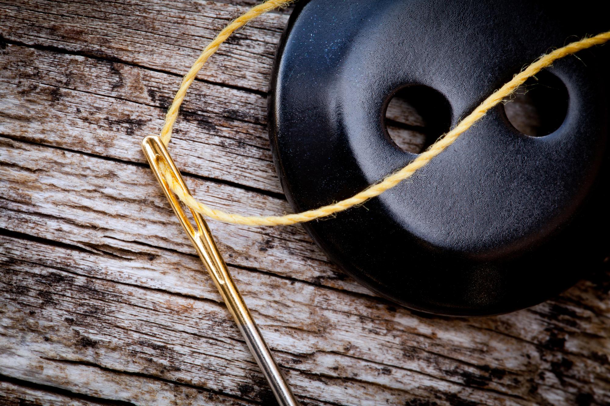Detailed goldwork stitches on velvet